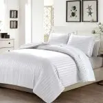 ⁦كفر مفروشات سرير قطني مخلوط مقاس دبل – اشترِ 1 واحصل على 2 مجانًا بـ 3 ألوان مختلفة (رصاصي، بيج، أبيض)⁩ - الصورة ⁦3⁩